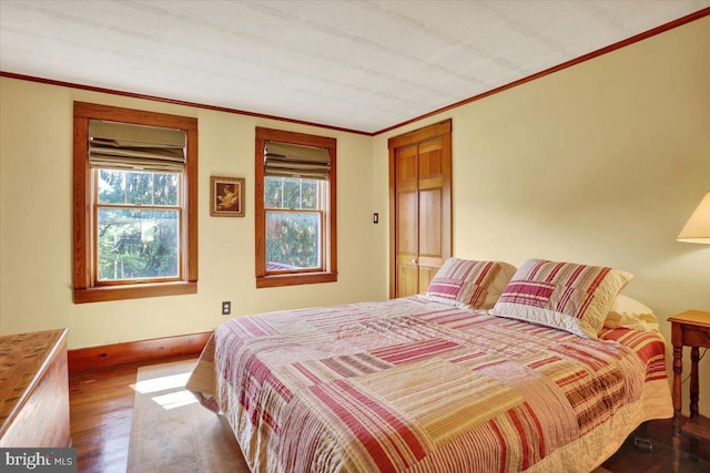 3401 Eisenbrown Rd, Reading, PA 19605 - bedroom with crown molding, baseboards, and wood finished floors