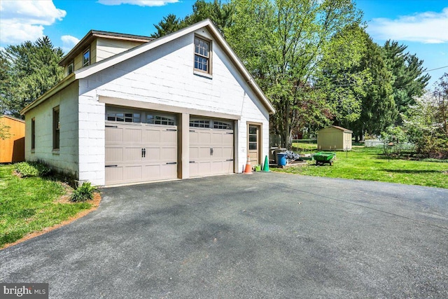 3401 Eisenbrown Rd, Reading, PA 19605 - detached garage featuring a storage shed