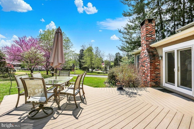 3401 Eisenbrown Rd, Reading, PA 19605 - wooden deck with a lawn and outdoor dining space