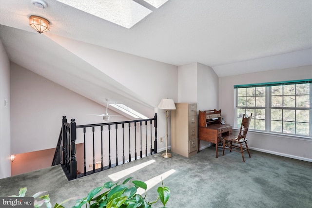 12116 Greenway Ct Unit 302, Fairfax, VA 22033 - carpeted home office featuring baseboards and lofted ceiling with skylight