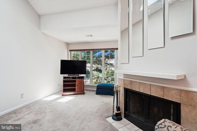 12116 Greenway Ct Unit 302, Fairfax, VA 22033 - carpeted living area featuring baseboards, a fireplace, and visible vents