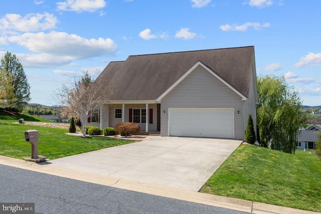 view of front of property with a garage, roof with shingles, concrete driveway, and a front lawn