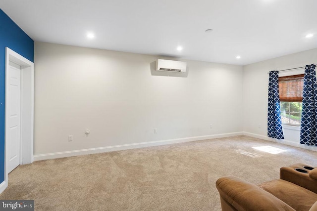 interior space featuring baseboards, a wall unit AC, recessed lighting, and light carpet