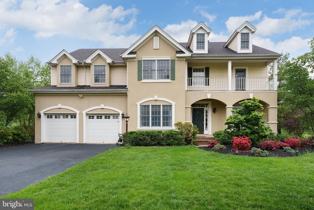 3 Firestone Ct, Skillman, NJ 08558 - view of front of property featuring a balcony, driveway, an attached garage, a front yard, and stucco siding