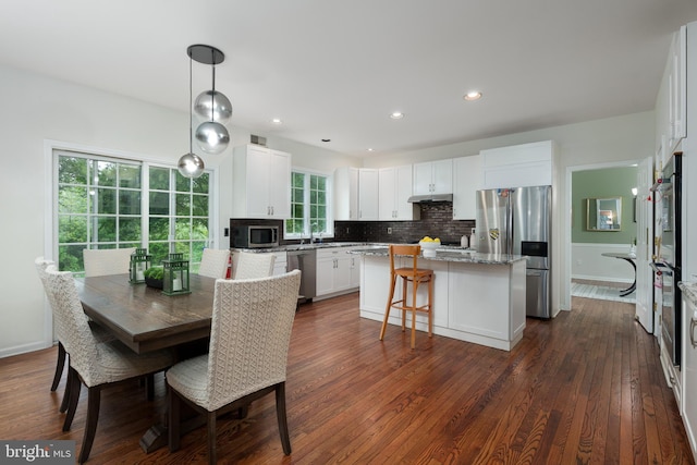 3 Firestone Ct, Skillman, NJ 08558 - dining room featuring dark wood finished floors, recessed lighting, and baseboards
