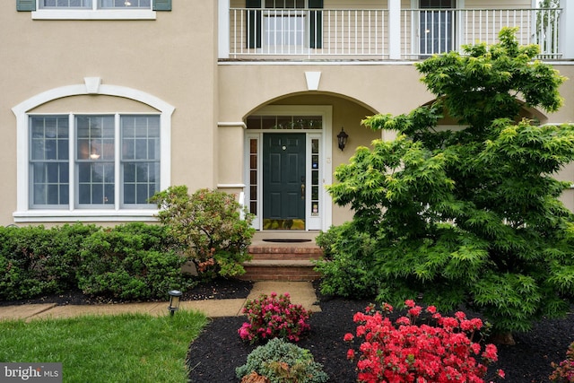 3 Firestone Ct, Skillman, NJ 08558 - doorway to property with a balcony and stucco siding