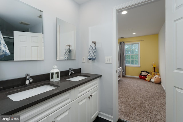 3 Firestone Ct, Skillman, NJ 08558 - bathroom with double vanity, recessed lighting, and baseboards