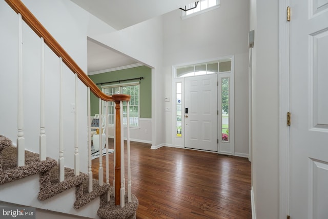 3 Firestone Ct, Skillman, NJ 08558 - entrance foyer with stairway, wood finished floors, baseboards, and crown molding