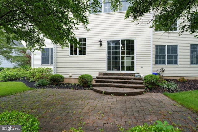 3 Firestone Ct, Skillman, NJ 08558 - rear view of house featuring entry steps and a patio
