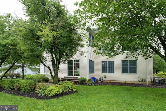 3 Firestone Ct, Skillman, NJ 08558 - rear view of house with a yard and central air condition unit