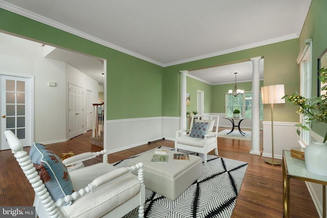 3 Firestone Ct, Skillman, NJ 08558 - living area featuring ornate columns, wood finished floors, a chandelier, crown molding, and baseboards