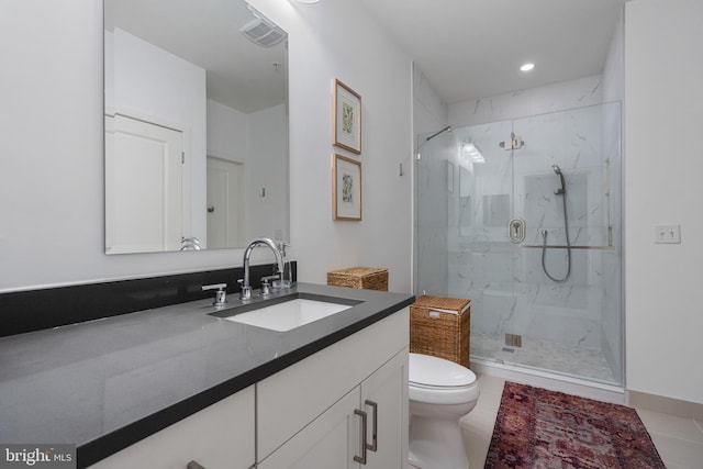 bathroom featuring a marble finish shower, vanity, toilet, and visible vents