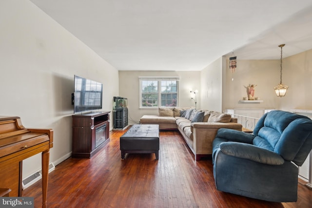 living area with dark wood finished floors