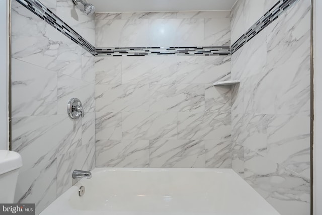 bathroom featuring toilet and shower / washtub combination