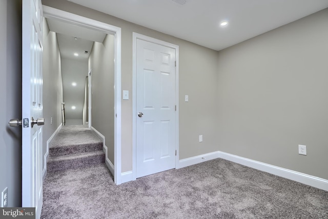 stairs featuring carpet floors, recessed lighting, and baseboards