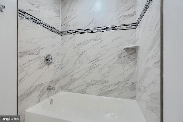 full bath featuring shower / washtub combination