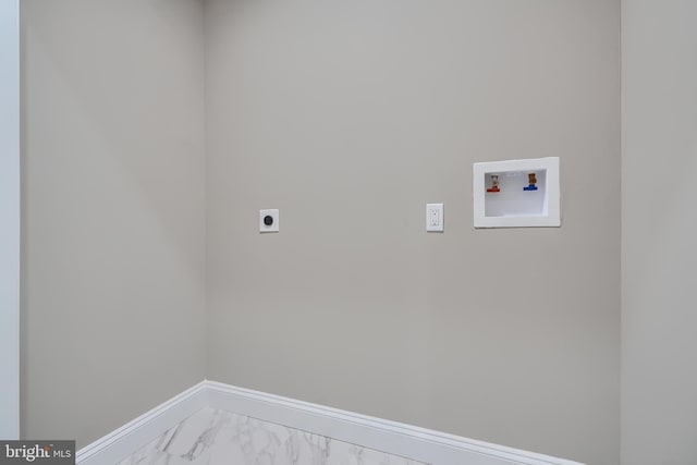 clothes washing area with laundry area, electric dryer hookup, baseboards, hookup for a washing machine, and marble finish floor
