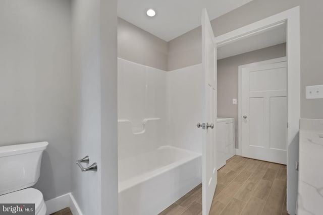 10 Susan Trl, Fairfield, PA 17320 - bathroom with vanity, wood finished floors, toilet, baseboards, and washer / clothes dryer