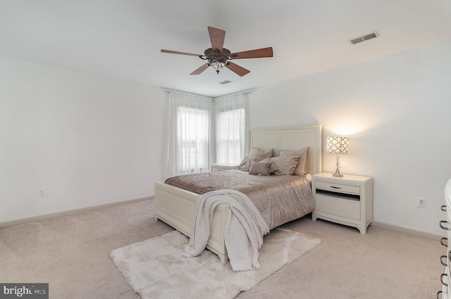 9116 Mineola Ct, Manassas, VA 20111 - bedroom with light carpet, ceiling fan, and baseboards
