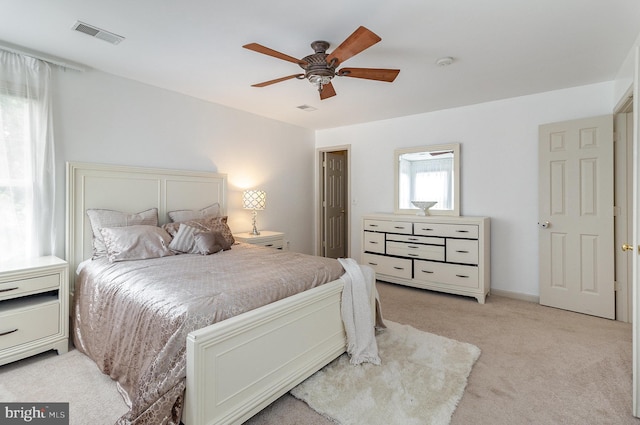 9116 Mineola Ct, Manassas, VA 20111 - bedroom with light carpet and a ceiling fan