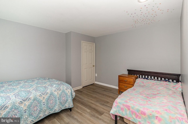 9116 Mineola Ct, Manassas, VA 20111 - bedroom with light wood-style floors and baseboards