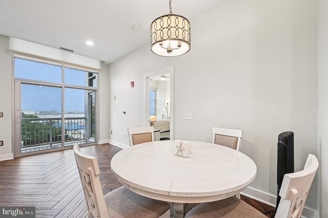 2772 Lighthouse Pt E Unit 410, Baltimore, MD 21224 - dining room with parquet floors, a water view, and recessed lighting