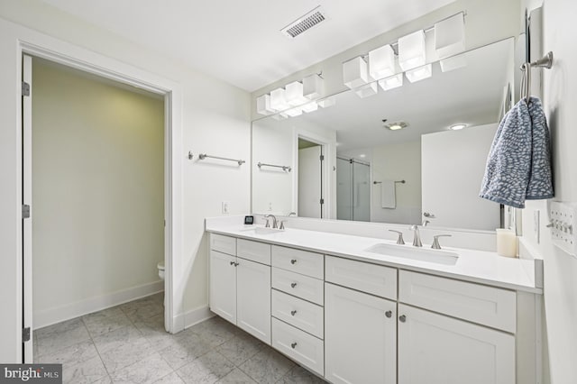 2772 Lighthouse Pt E Unit 410, Baltimore, MD 21224 - full bathroom featuring double vanity, a stall shower, and marble finish floors