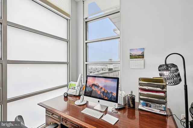 2772 Lighthouse Pt E Unit 410, Baltimore, MD 21224 - office area with a high ceiling and wood finished floors