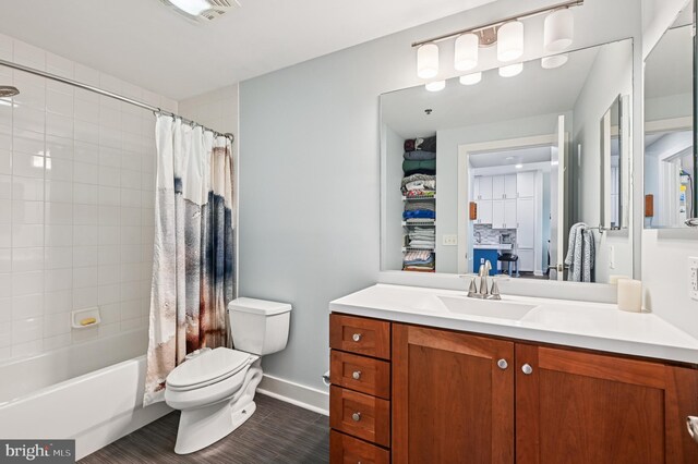 2772 Lighthouse Pt E Unit 410, Baltimore, MD 21224 - bathroom featuring vanity, shower / tub combo, and wood finished floors