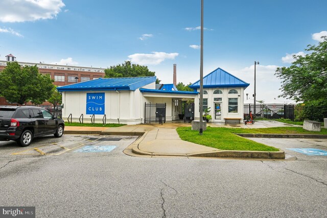 2772 Lighthouse Pt E Unit 410, Baltimore, MD 21224 - view of property featuring uncovered parking