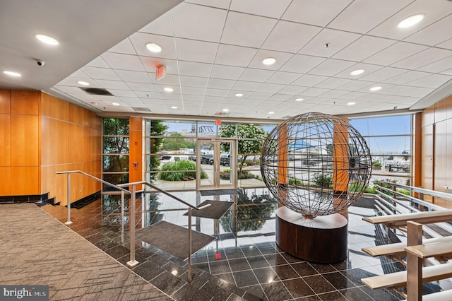 2772 Lighthouse Pt E Unit 410, Baltimore, MD 21224 - community lobby with a wall of windows, a security system, and recessed lighting