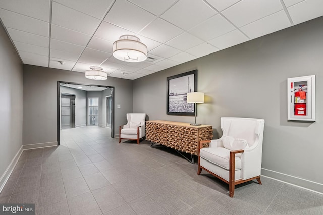 2772 Lighthouse Pt E Unit 410, Baltimore, MD 21224 - sitting room featuring a drop ceiling and baseboards