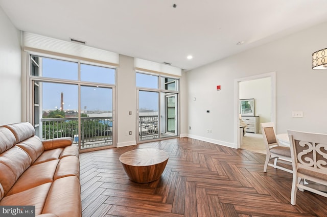 2772 Lighthouse Pt E Unit 410, Baltimore, MD 21224 - living room featuring baseboards and recessed lighting