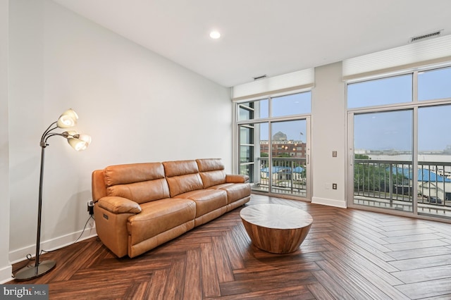 2772 Lighthouse Pt E Unit 410, Baltimore, MD 21224 - living area featuring baseboards and recessed lighting