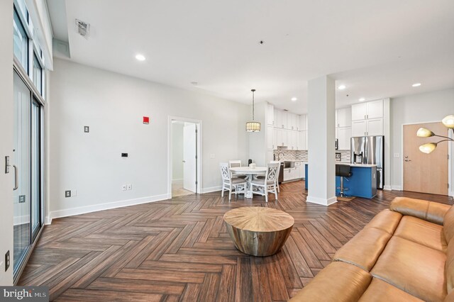 2772 Lighthouse Pt E Unit 410, Baltimore, MD 21224 - living area with recessed lighting and baseboards