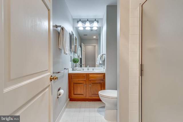 full bath with tile patterned floors, toilet, vanity, and an enclosed shower
