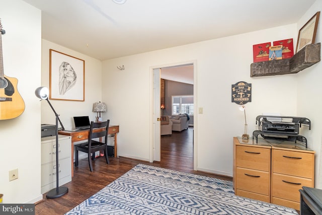 office featuring baseboards and dark wood-type flooring