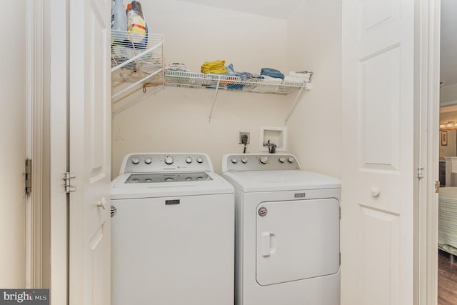 clothes washing area with laundry area and washing machine and dryer