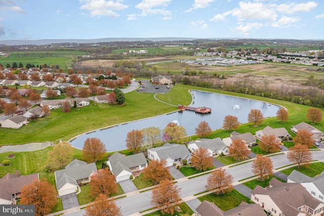 aerial view with a water view and a residential view