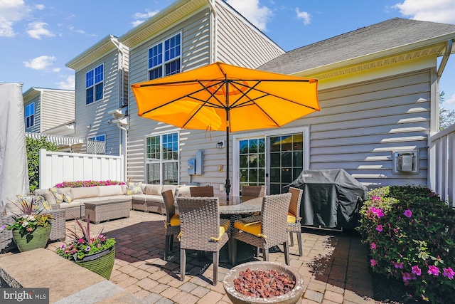 44451 Cruden Bay Dr, Ashburn, VA 20147 - view of patio with fence, an outdoor living space, and grilling area