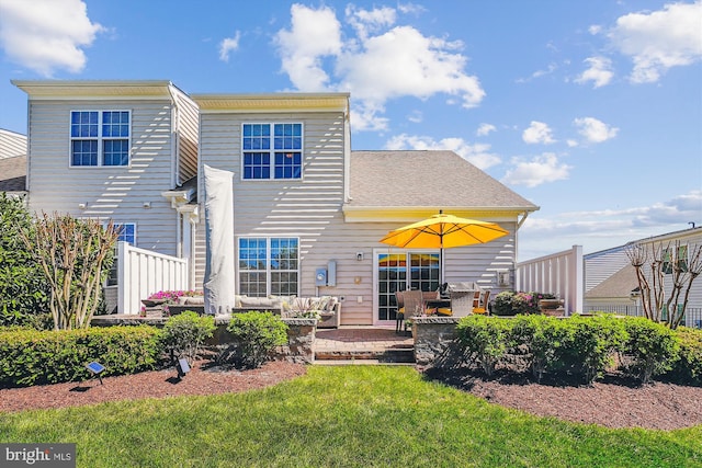 44451 Cruden Bay Dr, Ashburn, VA 20147 - back of property featuring a yard, a patio, and outdoor lounge area