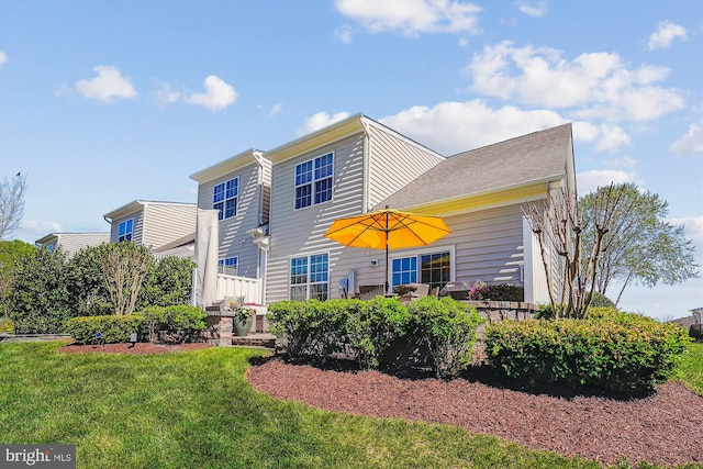 44451 Cruden Bay Dr, Ashburn, VA 20147 - back of property featuring a yard