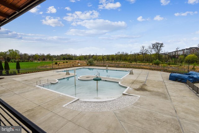 44451 Cruden Bay Dr, Ashburn, VA 20147 - view of pool with a fenced in pool, a patio area, and fence
