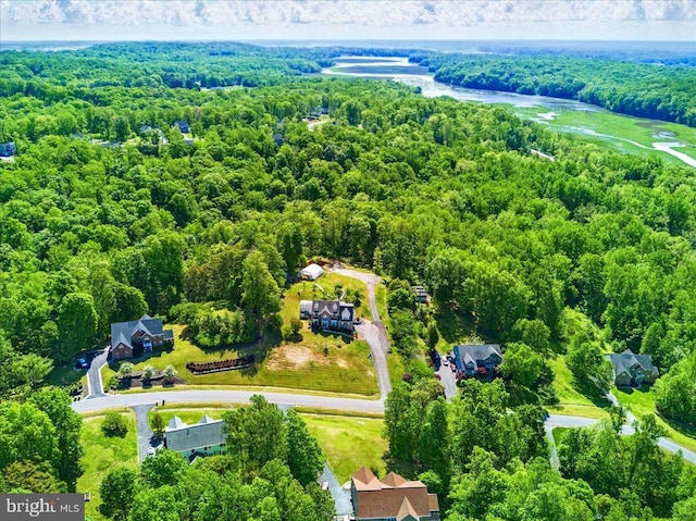aerial view featuring a forest view