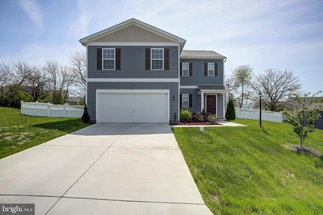 11174 Cross Fields Dr, Waynesboro, PA 17268 - view of front facade with an attached garage, a front lawn, fence, and driveway