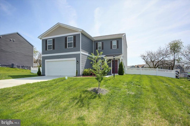 11174 Cross Fields Dr, Waynesboro, PA 17268 - traditional-style house featuring a garage, a front lawn, fence, and driveway