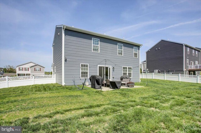 11174 Cross Fields Dr, Waynesboro, PA 17268 - rear view of property featuring a fenced backyard, a patio, and a yard