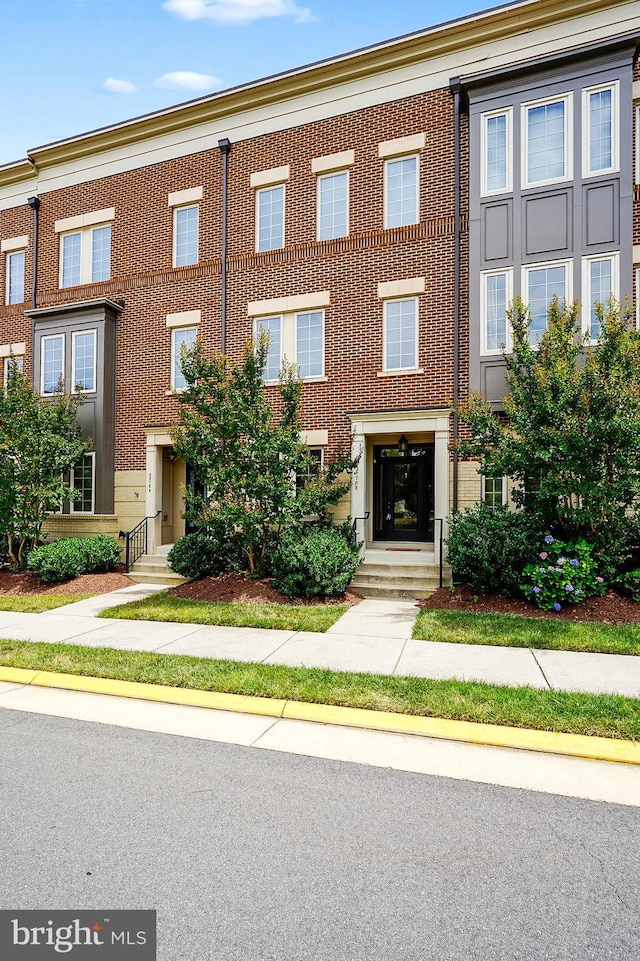 22788 Sagamore Sq, Brambleton, VA 20148 - view of property with brick siding