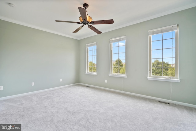 22788 Sagamore Sq, Brambleton, VA 20148 - carpeted spare room featuring baseboards, ceiling fan, ornamental molding, and visible vents