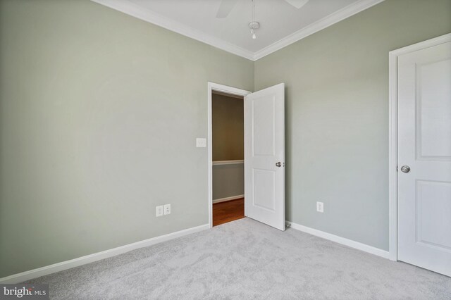 22788 Sagamore Sq, Brambleton, VA 20148 - unfurnished bedroom featuring ceiling fan, baseboards, ornamental molding, and carpet floors
